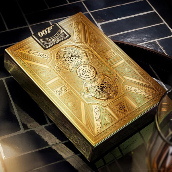 theory11 James Bond 007 Special Edition Box Set – Collector Playing Cards with 3 Gold Edition Decks + Solid Brass 007 Pen & Secret Hidden Compartment – Luxury Gift for 007 Fans & Card Enthusiasts