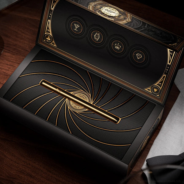 theory11 James Bond 007 Special Edition Box Set – Collector Playing Cards with 3 Gold Edition Decks + Solid Brass 007 Pen & Secret Hidden Compartment – Luxury Gift for 007 Fans & Card Enthusiasts